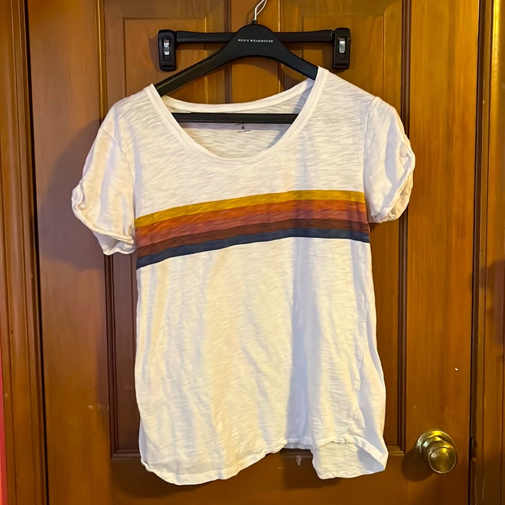 White tee with rainbow design
